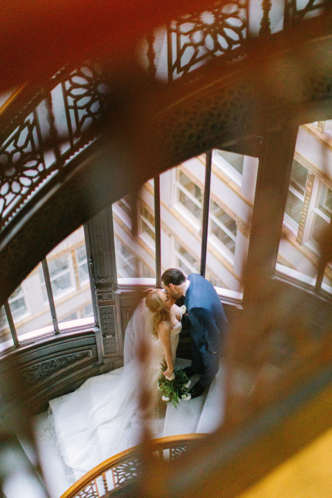 Bride and Groom on Stairs at the Rookery Building